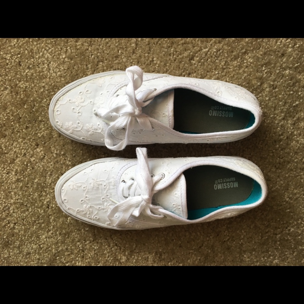 White eyelet shoes